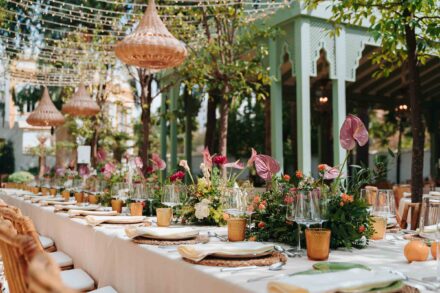 Reception table decor with flowers and candles at Hacienda Villa Luisa wedding in Seville