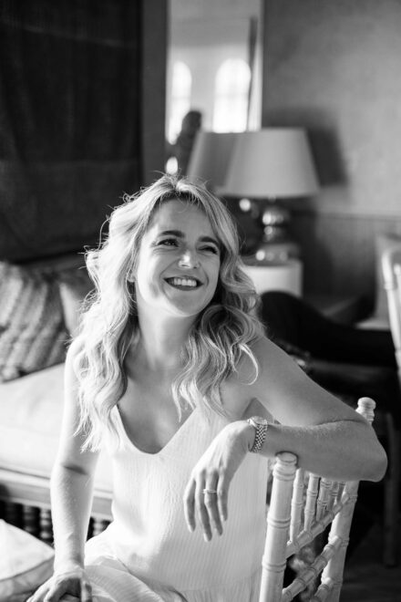 Bride smiling during getting ready moment in natural light at Hacienda Villa Luisa Seville