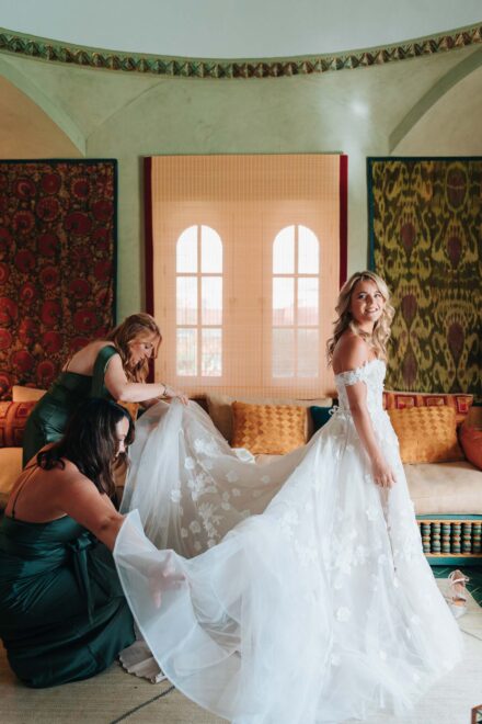 Bride smiling during getting ready moment in natural light at Hacienda Villa Luisa Seville