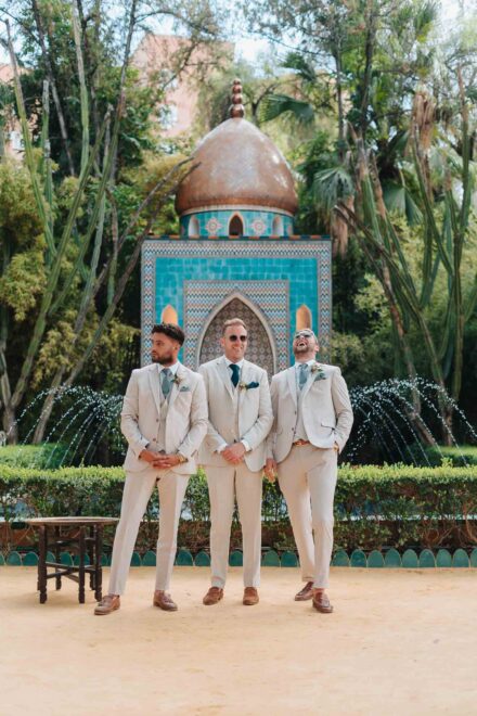 Groom and groomsmen portrait in Seville garden