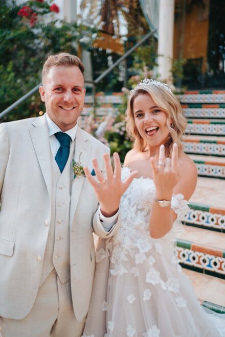 Wedding couple walking at Hacienda Villa Luisa in Seville