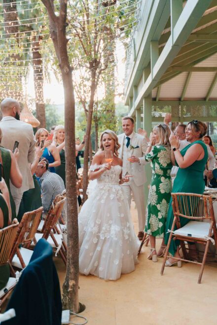 Wedding dinner moment in Seville with guests celebrating