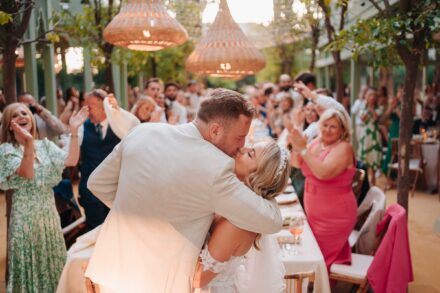 Wedding dinner moment in Seville with guests celebrating