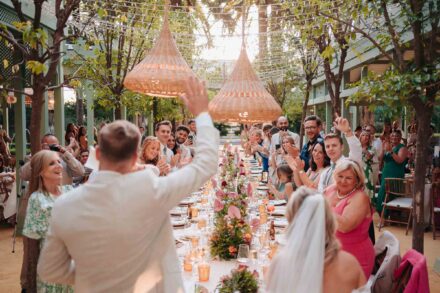 Wedding dinner moment in Seville with guests celebrating